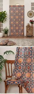 Detail of bohemian mandala door curtain with sunset geometric patterns and matching pillow