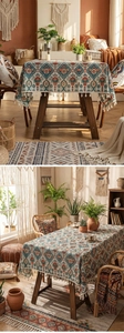 Close-up of Bohemian geometric pattern tablecloth with cream tassel fringe detail