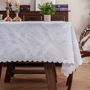 Elegant white Damascus jacquard tablecloth with scalloped edges for dining room decor