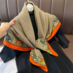 Vintage silk scarf with interlocking chain pattern and orange paisley border detail