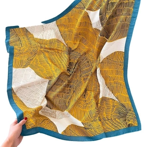 Abstract leaf pattern scarf with mustard yellow and teal trim for women's fashion