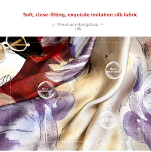 Detailed macro view of high-quality floral print silk scarf fabric with elegant texture