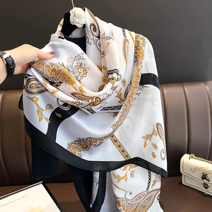 Elegant white paisley silk shawl with black borders and floral patterns for women