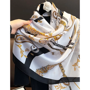 Elegant black and gold paisley silk scarf shawl for women with smooth satin finish