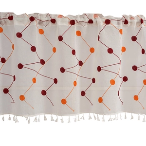 White cafe curtain with colorful embroidered polka dots and elegant white tassel trim