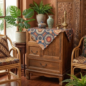 Bohemian mandala table runner with navy blue geometric prints and scalloped edge detail