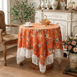 French retro round tablecloth with orange floral pattern and white lace trim edge