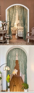 Detail of dark green French lace curtain featuring delicate floral patterns and ruffled edges