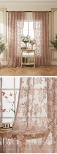 Detailed texture of dusty pink floral lace sheer curtains for bedroom windows