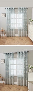 Detail of light blue damask sheer curtain with silver grommets in Nordic style