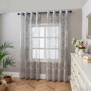 Minimalist grey tulle curtains with white floral embroidery and grommet top for living room