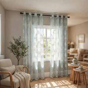 Light blue translucent sheer curtains with white damask floral embroidery in Nordic style
