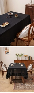Close-up of black linen tablecloth featuring elegant ruffled edges and natural texture