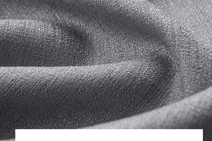 Macro shot showing high-density dark grey faux linen fabric texture with cross-weave detail