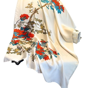 Elegant silk scarf with floral bird print and satin finish on an ivory base