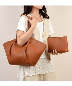 Brown litchi leather tote bag and small zipper pouch set with knot handle and bottom rivets