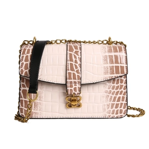 Elegant beige crocodile pattern flap crossbody bag with golden butterfly lock and chain