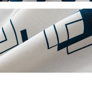 Macro detail of high-quality cotton linen curtain with navy blue geometric patterns