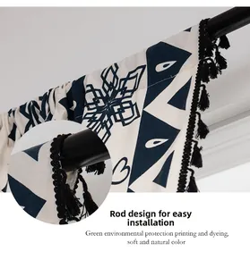 Detail of rod pocket design on bohemian cotton linen curtain with black tassels