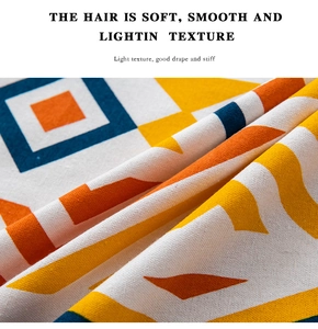 Detail of bohemian cotton linen curtain fabric with geometric print and dense texture