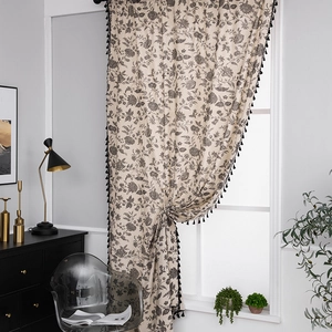 Bohemian cream linen curtains with black floral prints and elegant tassel edges