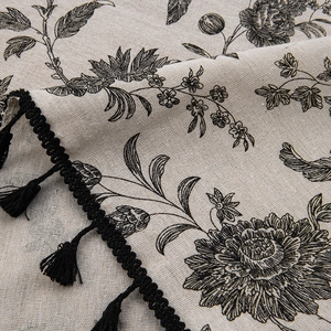 Beige cotton linen curtain with vintage floral prints and black tassel trim details