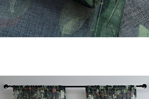 Macro detail of floral print curtains showing premium fabric texture and stitching