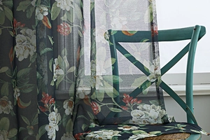Detailed texture of semi-sheer American vintage floral cotton linen window curtain