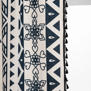 Bohemian cotton linen curtain featuring blue geometric patterns and black fringe tassels