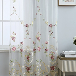 White embroidered tulle curtain with red roses and elegant floral vine patterns