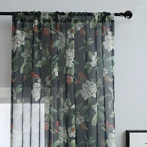 Floral sheer curtain with orange and white flowers on black semi-sheer fabric