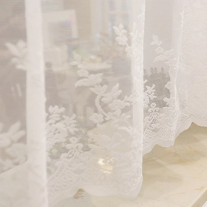 White Nordic lace sheer curtain with floral embroidery and elegant scalloped edges