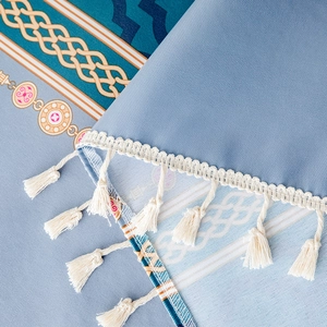 Nappe scandinave en PVC imperméable avec imprimé bleu ethnique et bordure à franges blanc