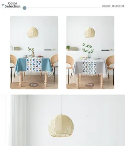 Detail of geometric triangle pattern PVC tablecloth with white tassel edge decoration