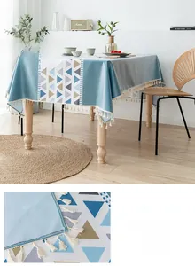 Close-up of Nordic PVC tablecloth with geometric patterns and elegant cotton tassel edges