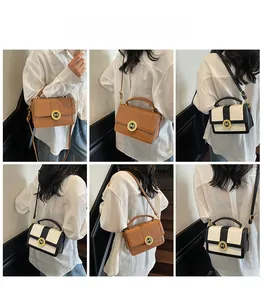 Detail view of quilted leather bag showing round metal M buckle and various carrying styles