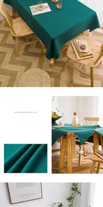 Detailed view of dark green waterproof tablecloth fabric with white tassel decorations