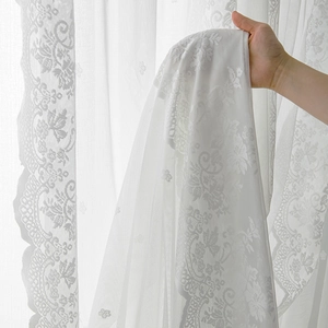 White lace sheer curtain with vintage floral embroidery and elegant wavy scalloped edges
