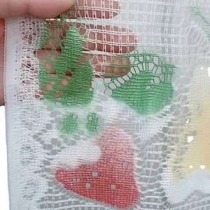 White lace cafe curtain with colorful fruit prints and hexagonal mesh texture