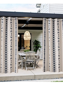 Detail of bohemian geometric print waterproof outdoor curtains with metal grommets