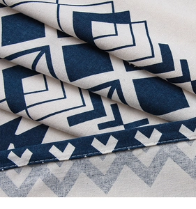 Close-up of bohemian navy geometric cotton linen curtain showing thick canvas texture