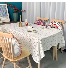 Detailed view of green geometric gold stamping on premium velvet rectangle tablecloth
