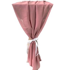 Elegant dusty pink chiffon chair sash with white ribbon for wedding table decoration