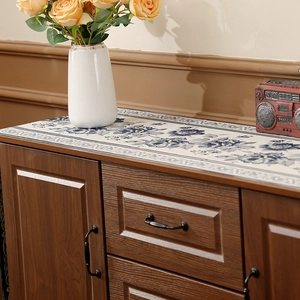 Classic Chinese style embroidered table runner with blue floral patterns on beige fabric
