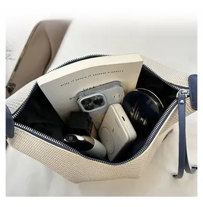 Top view of spacious woven underarm bag interior showing large storage capacity