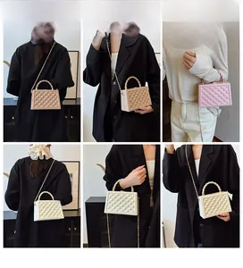 Detailed views of structured crossbody bag with lattice texture and chain strap