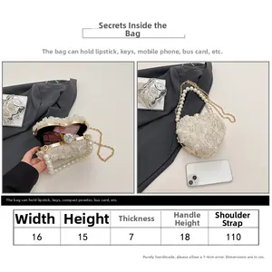 Size chart and details of heart-shaped lace evening bag with pearl handle and chain strap