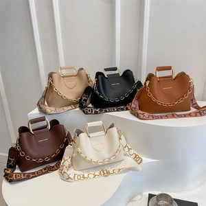 Minimalist bucket bags with chain detail and wide shoulder straps in five stylish colors