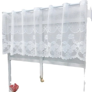 White lace cafe curtain with delicate floral patterns and scalloped edges for home decor