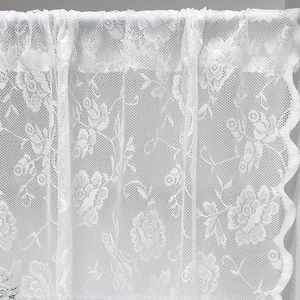 White lace door curtain with floral rose patterns and elegant scalloped edges for home decor